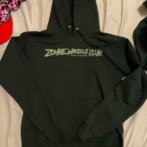 I got this @ hot topic. The letters are in the front and the photo in the back.